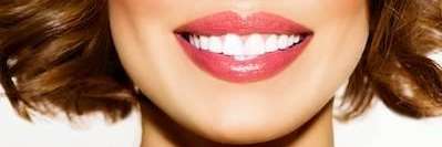 Smiling woman in Troy NY with white teeth